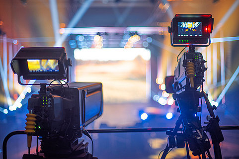 stream at a concert in a hall without spectators